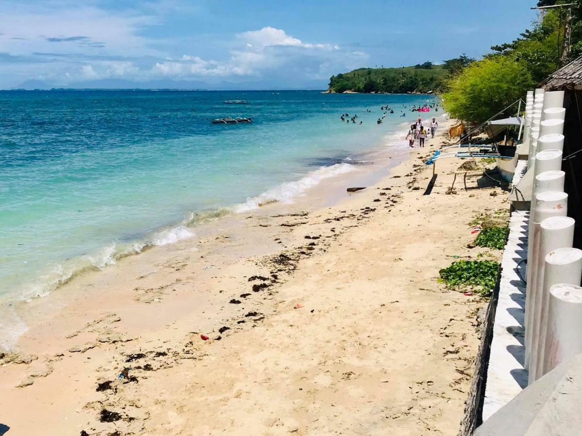 Daanbantayan Suba Beach Nipa Huts מראה חיצוני תמונה